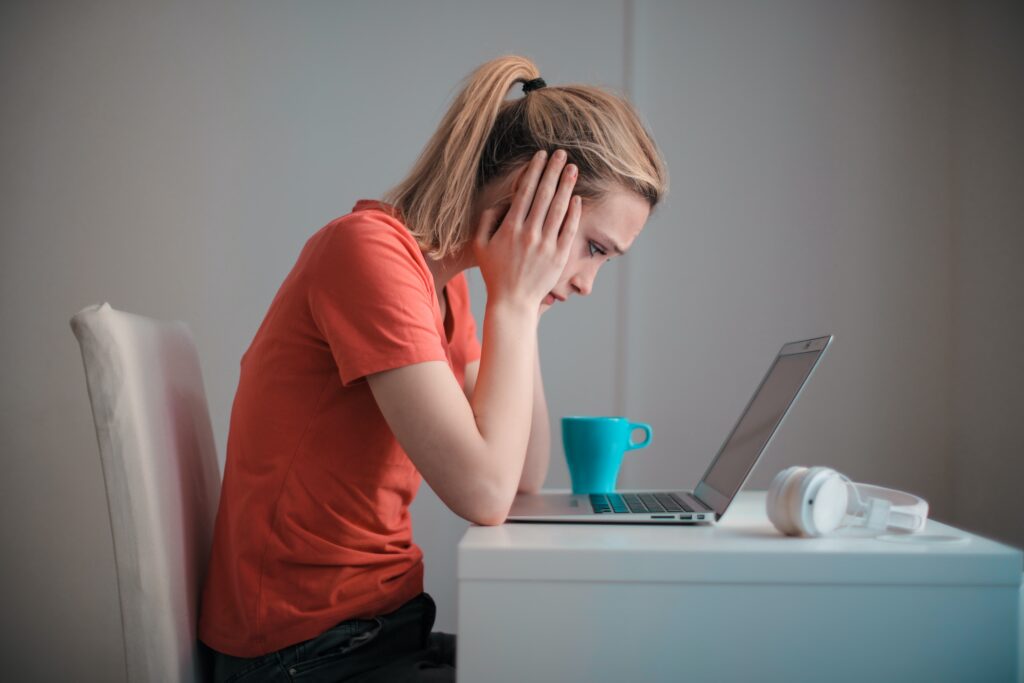 woman sad computer